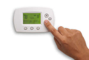 Digital Thermostat and male hand