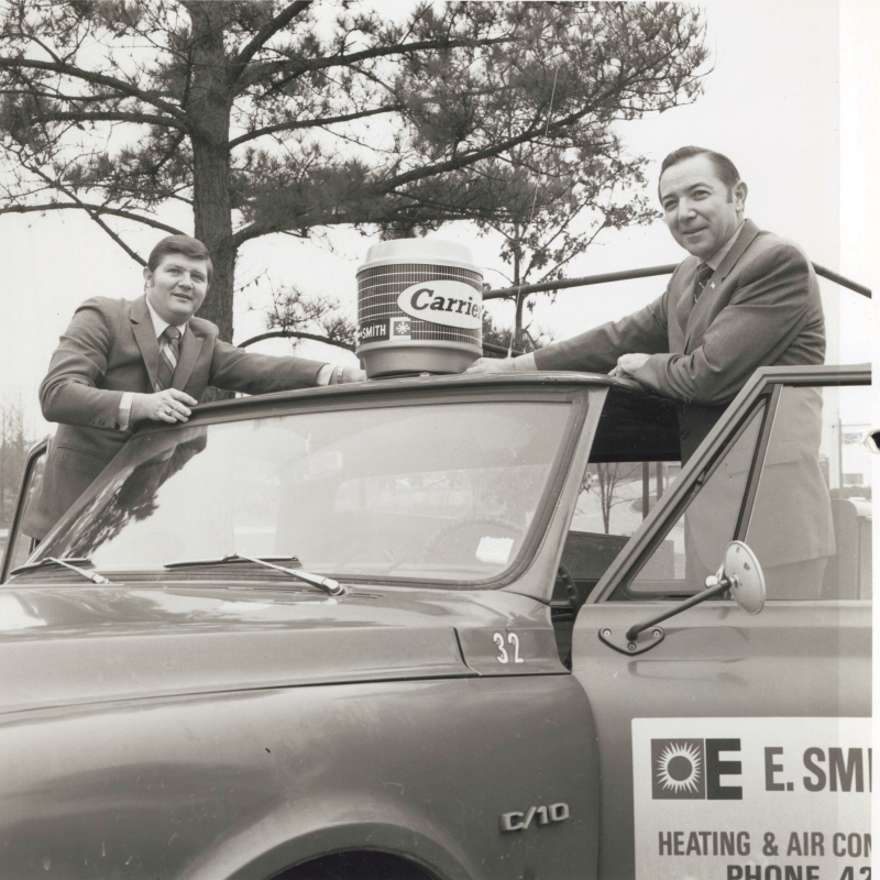 esmith history photo - truck with carrier logo